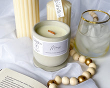 Load image into Gallery viewer, mimosa scented soy wax candle in cement vessel and wooden wick