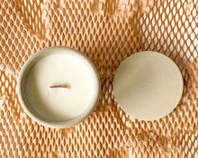 Load image into Gallery viewer, peach scented soy wax candle in cement vessel with wooden wick and lid