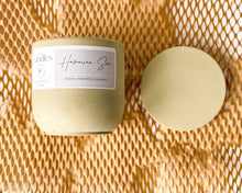 Load image into Gallery viewer, mango pineapple scented soy wax candle in cement vessel with wooden wick and lid