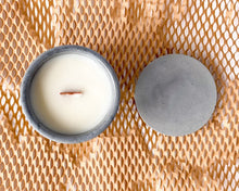 Load image into Gallery viewer, tabacco scented soy wax candle in cement vessel with lid

